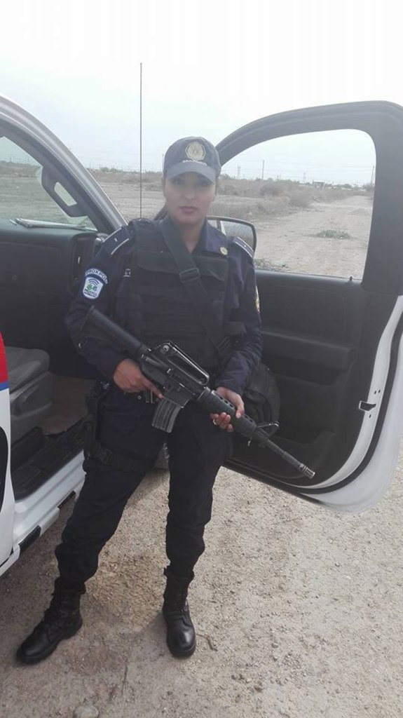 Garcia also posted some other less revealing pictures in her police uniform to the Facebook account