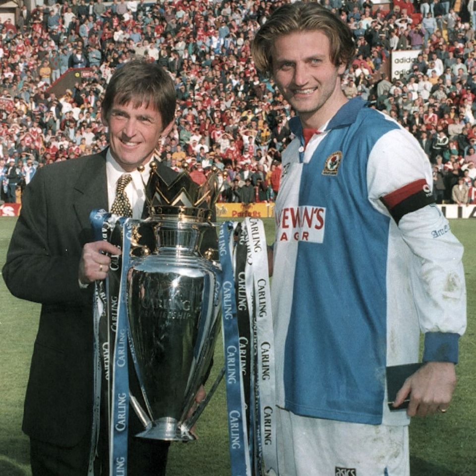 Kenny Dalglish and Tim Sherwood show off the Premier League title won in 1995