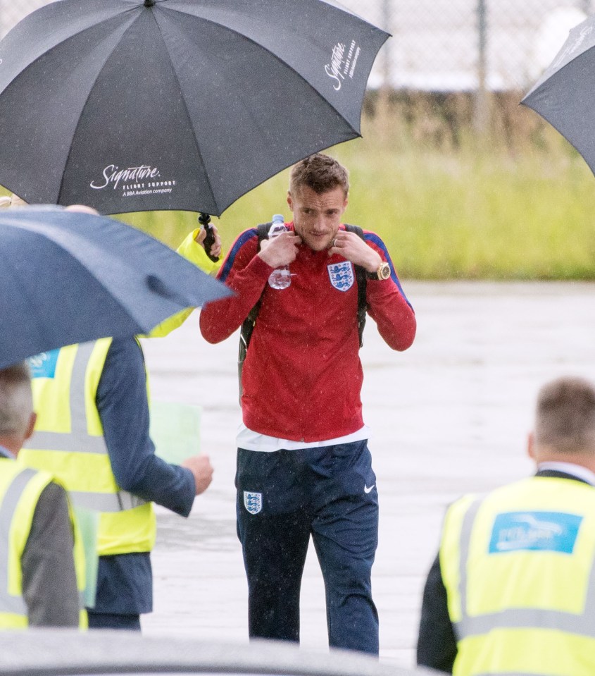Vardy after stepping off the plane and into the rain yesterday
