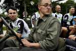 Mark Cavendish and his Dimension Data team-mates get a lift to the Tour de France team presentations in an army vehicle