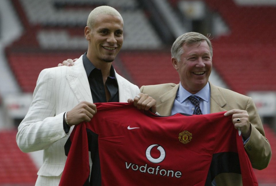 MANCHESTER - JULY 22: Alex Ferguson, the manager of Manchester United, shares a laugh with new signing Rio Ferdinand at a press conference at Old Trafford, Manchester, England on July 22, 2002. (Photo by Alex Livesey/Getty Images)