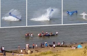 Dramatic moment plane crashes at airshow before crowds rush into sea to save pilot
