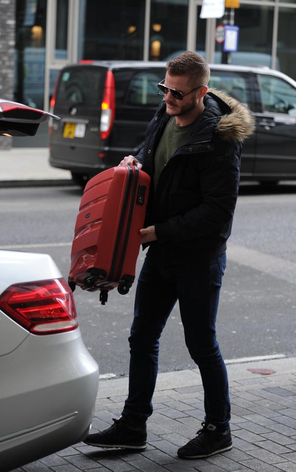 ... before loading his case into the boot and heading off - possibly to the CBB house