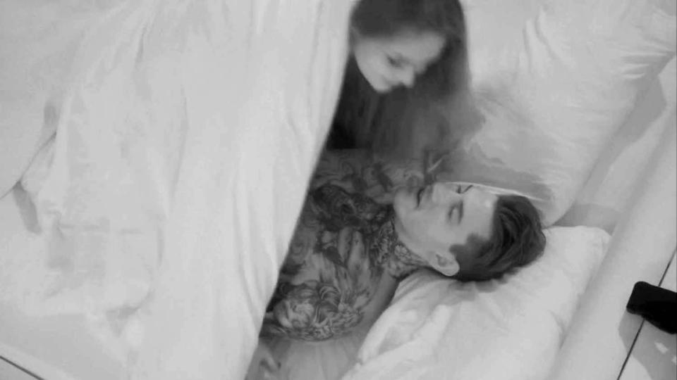  The couple infamously romped on top of the covers as their housemates looked on