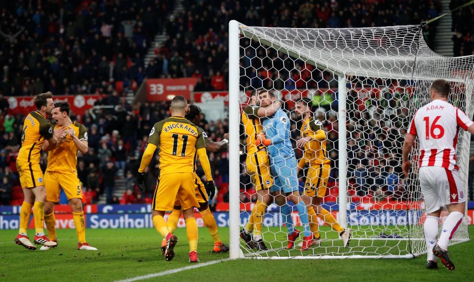 Mat Ryan celebrates his save