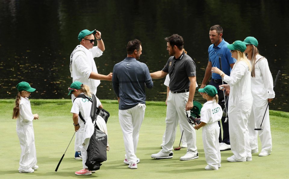  South Africans Louis Oosthuizen, Trevor Immelman and Charl Schwartzel shake hands