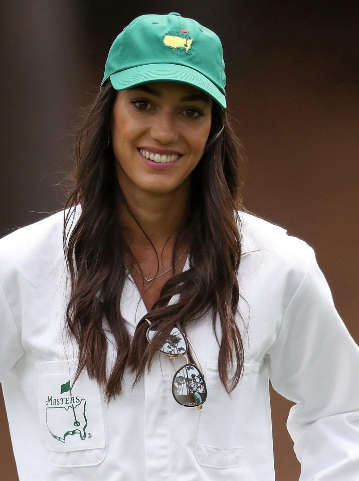 Allison Stokke, girlfriend of Rickie Fowler of the United States (not pictured), walks the course