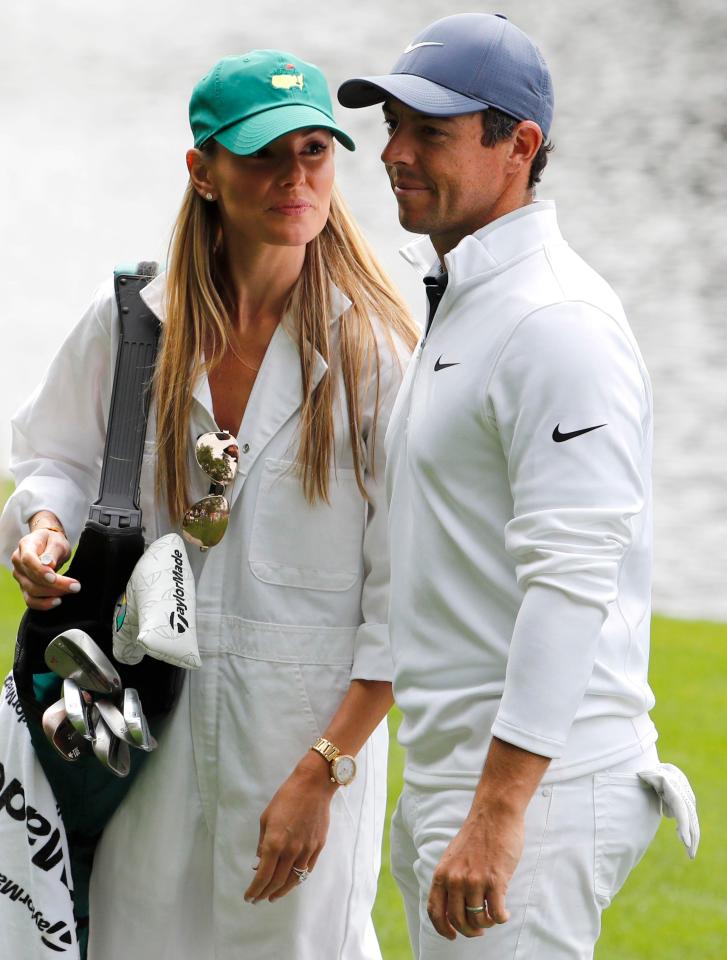 Rory McIlroy of Northern Ireland talks with his wife Erica Stoll