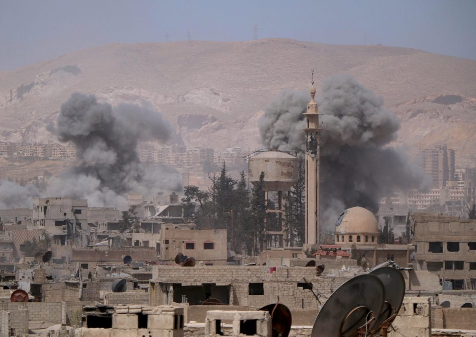  Smoke rises after the bomb attack. Earlier estimates put the death toll as high as 150