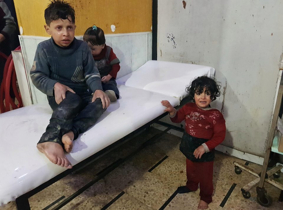  Injured Syrian children wait for treatment after a reported chemical attack