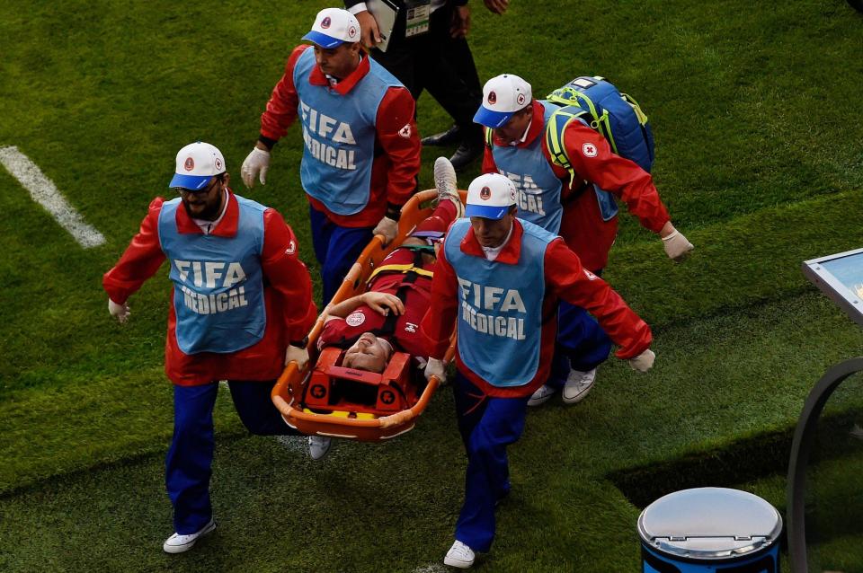  William Kvist's tournament is in doubt after he was carried off on a stretcher