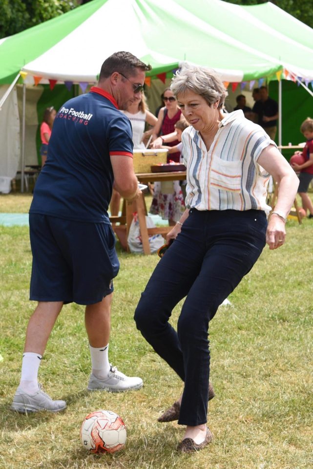  Theresa May was seen copying Harry Kane’s penalty prowess at a summer fair this weekend