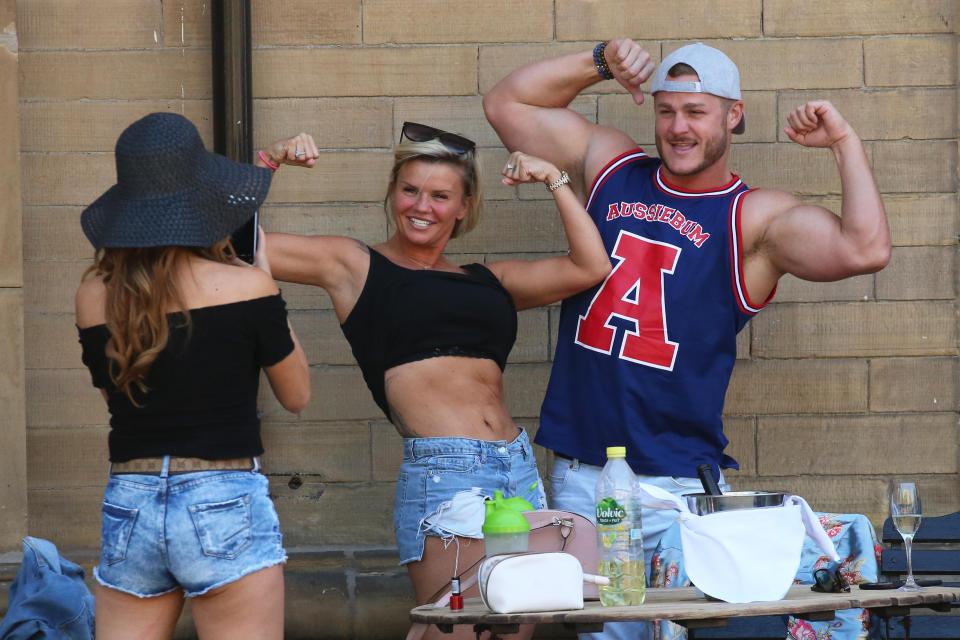  She showed off her toned abs and arm muscles alongside CBB star Austin Armacost