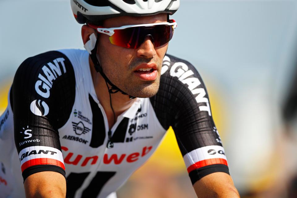 Tom Dumoulin lost 52sec on the day after picking up a flat tyre just three miles from the end of the stage