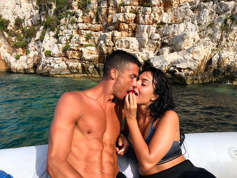 Cristiano Ronaldo and Georgina Rodriguez appear to share a snack together while on holiday in Greece