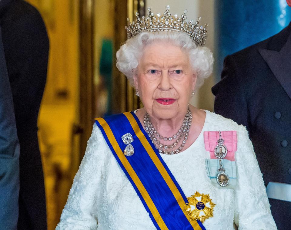 The Queen looking radiant as she welcomes her guests who are close friends