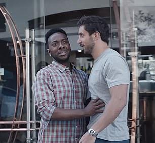 One man also stops another from catcalling a woman as she walks past