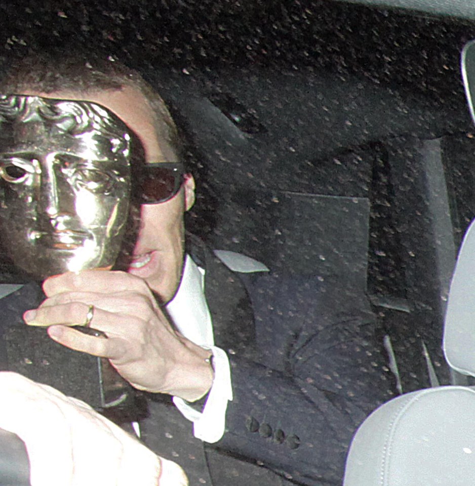 Benedict Cumberbatch hides behind his Best Actor gong and shades as he sneaks off early from the Baftas