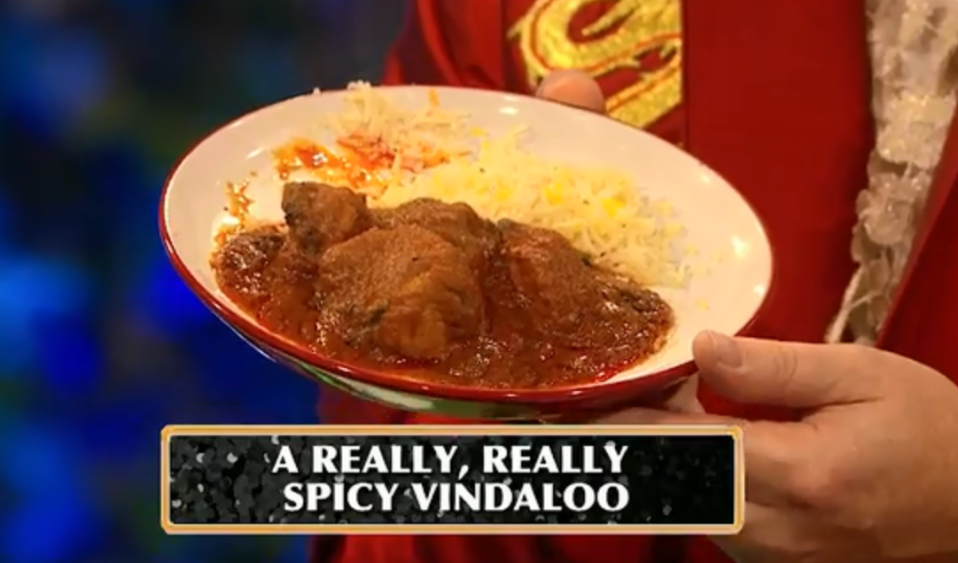  The Spice Girl singer has to guess what she's licking, with one of the items being a spicy vindaloo