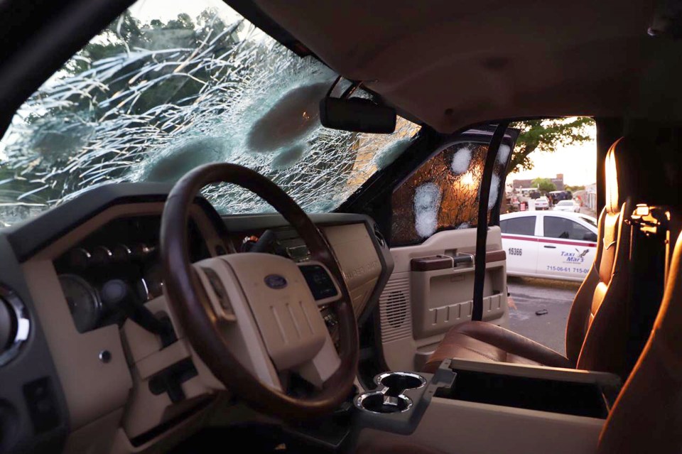  An armoured vehicle is riddled with bullet holes after clashes on the streets of Culiacan