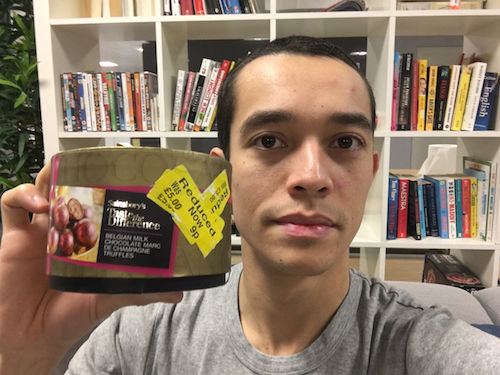  Tom Church, 29, founder of LatestDeals.co.uk with a yellow sticker bargain from Sainsbury's