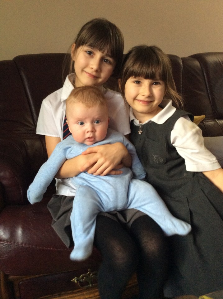 Holly's children Molly, nine, and Bella, seven, (pictured with Cloud) like to scan items in store with her