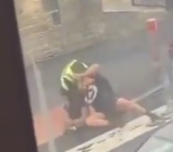 Shocking footage shows the officer grappling with Ahmad in Halifax, West Yorks