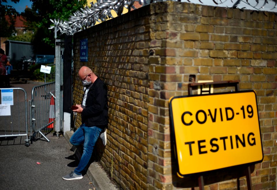 A man tries to get a test in East Ham, London today