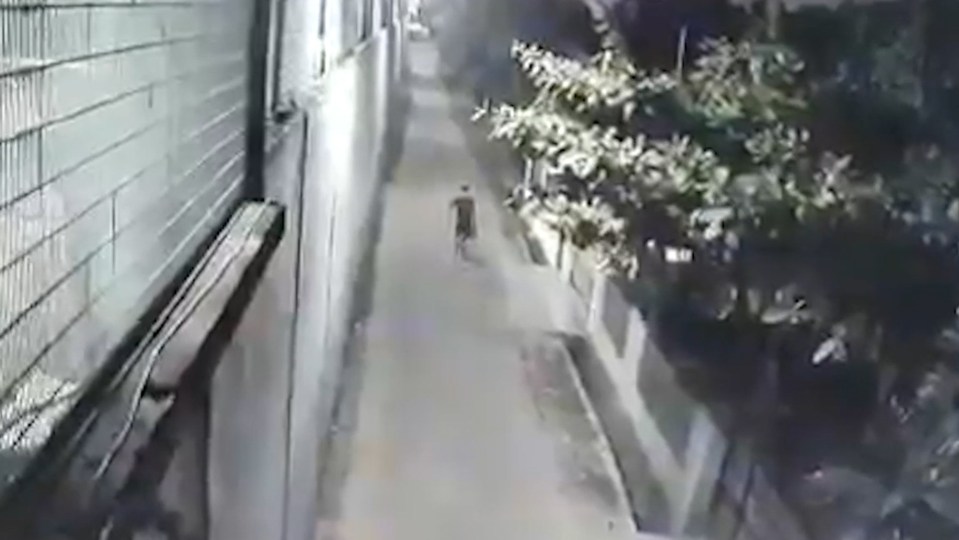 CCTV footage shows the desperate fugitive emerging from the pipe network