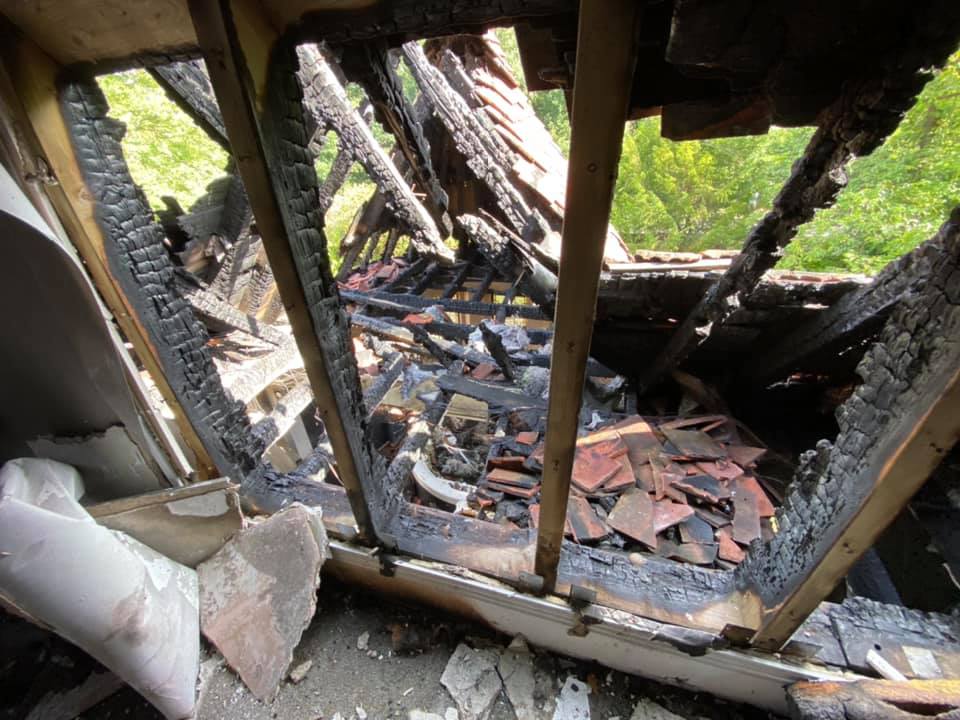 The roof is crumbling in on the building