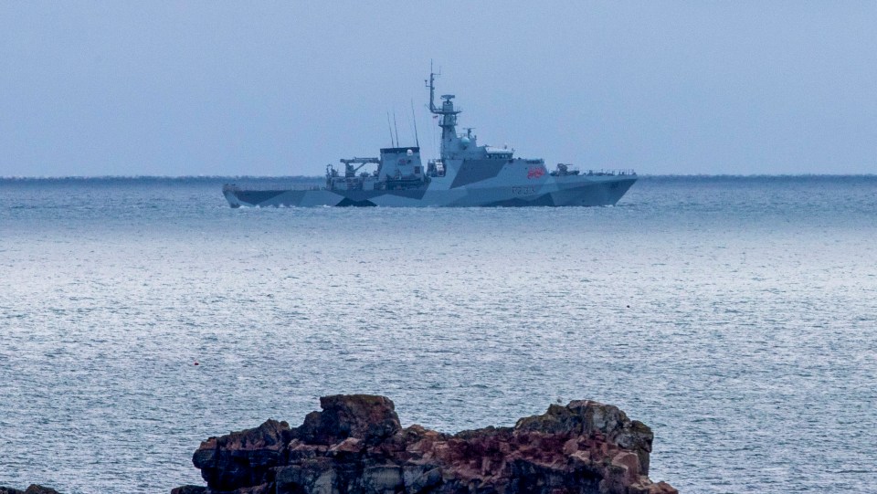 The Royal Navy's HMS Tamar patrols off the Jersey coast