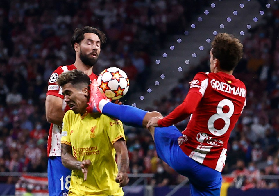 Antoine Griezmann's foot went into the face of Firmino as he challenged for the ball