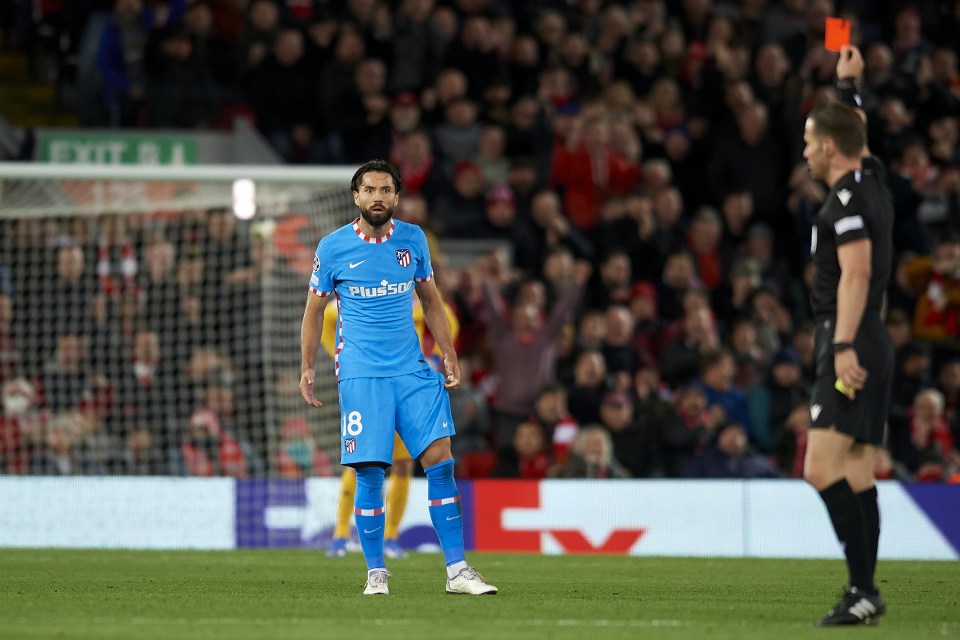 Felipe looks shocked as he sees red from the referee at Anfield