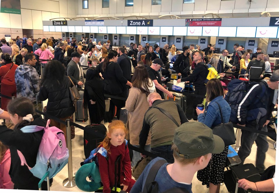 Lines at Manchester Airport stretched back as travellers desperately tried to check in