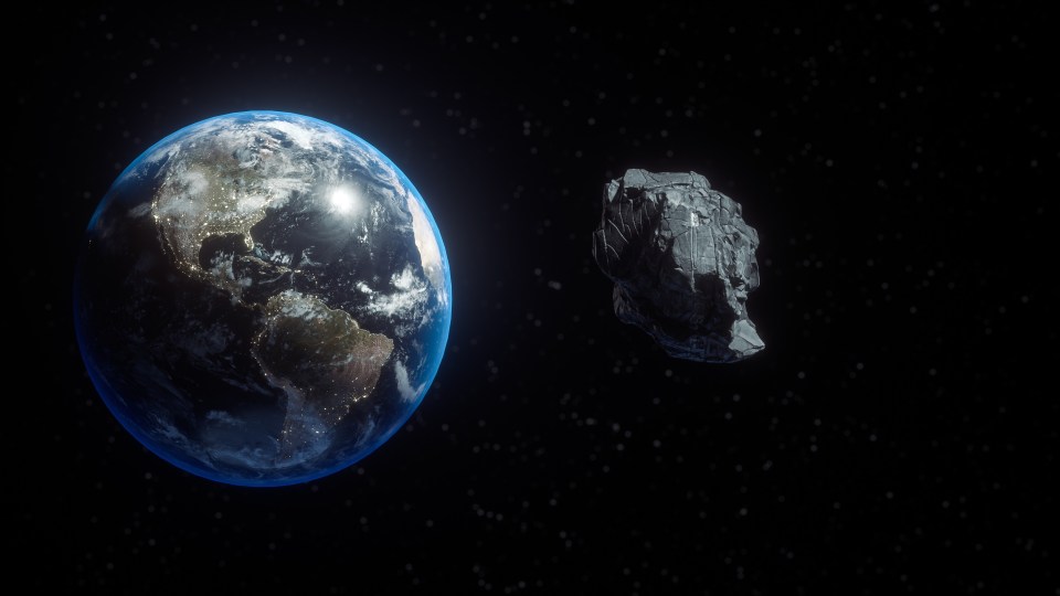 the earth and an asteroid are shown in space