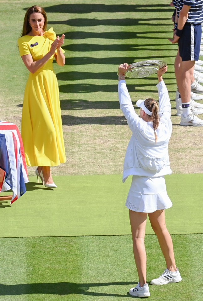 Kate watched on and applauded as Rybakina lifted the Venus Rosewater dish