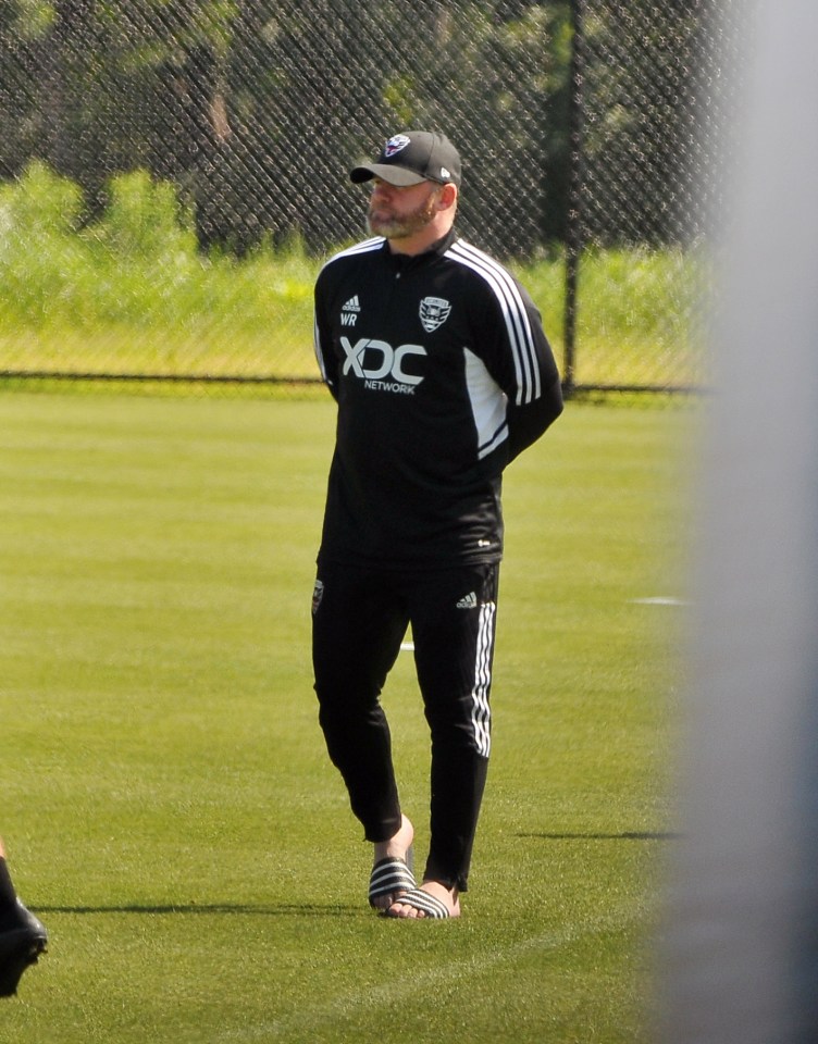 Rooney looked relaxed in his sliders as he took a look at his squad