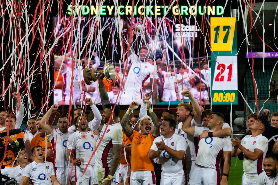 Courtney Lawes lifts the Ella-Mobbs Trophy