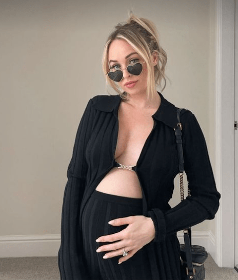 Jorgie Porter looked amazing in an all black outfit that exposed her baby bump