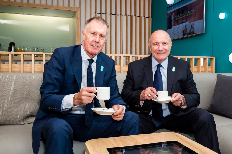 George and Sir Geoff Hurst have a cup of tea in 2009 at Wembley