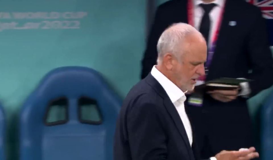 Arnold quickly read the piece of paper and then handed it to his coaching staff