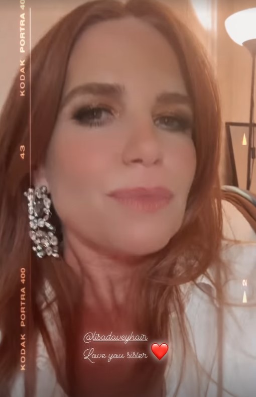 The actress, 50, pouted for the camera following a sleek blow dry