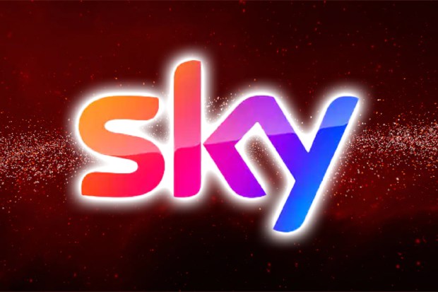 a colorful sky logo on a red background