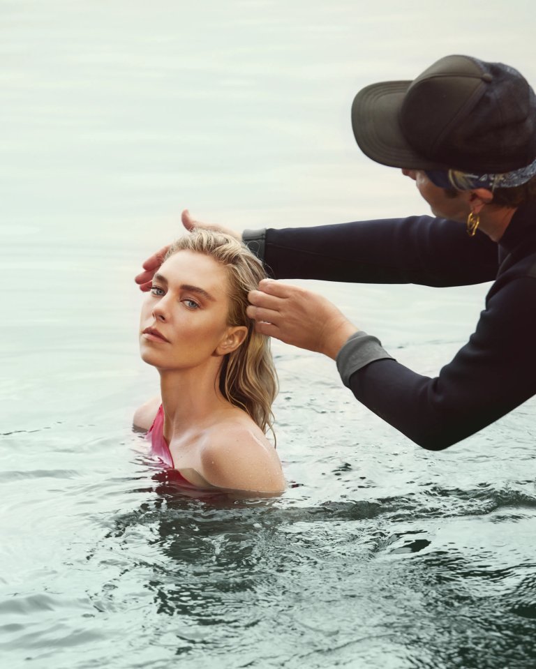 Kirby was seen having her hair styled as she posed in the water for a second stunning shot