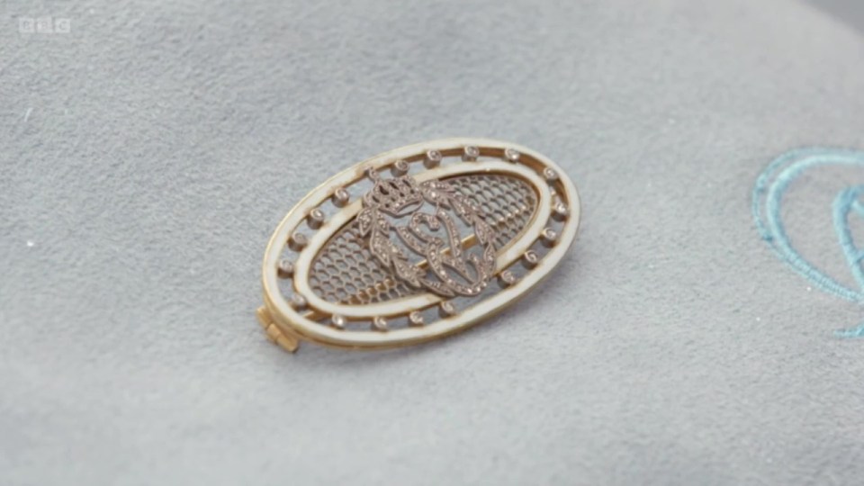 A brooch had the initials of diamond set initials of Victoria Eugenie, a grandchild of Queen Victoria