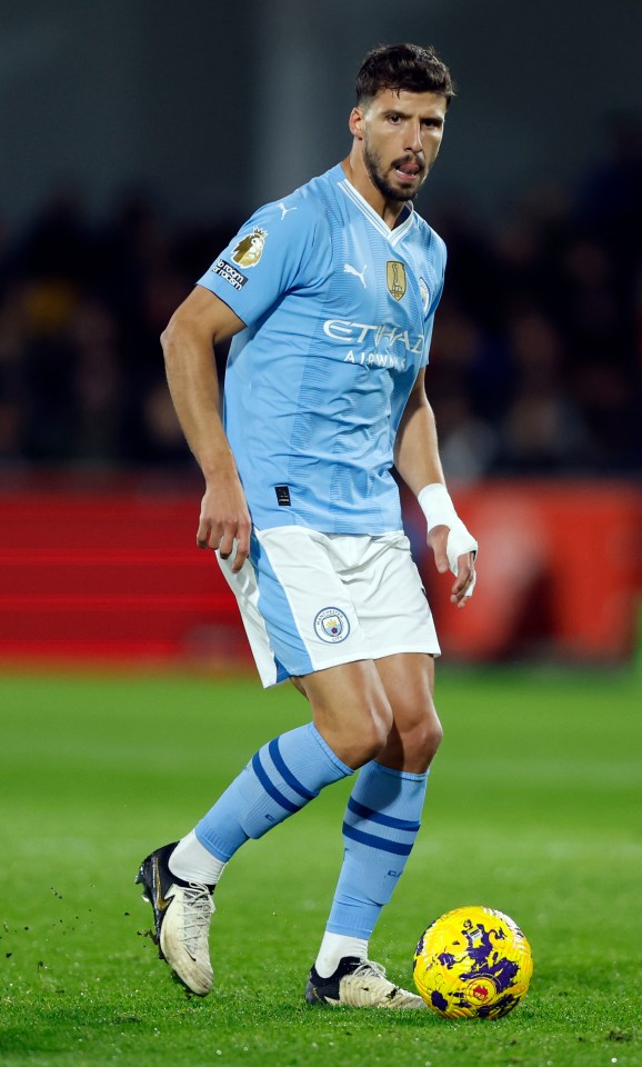 Ruben Dias of Manchester City on the ball during a Premier League match.