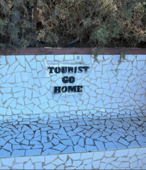 Graffiti protesting against tourists