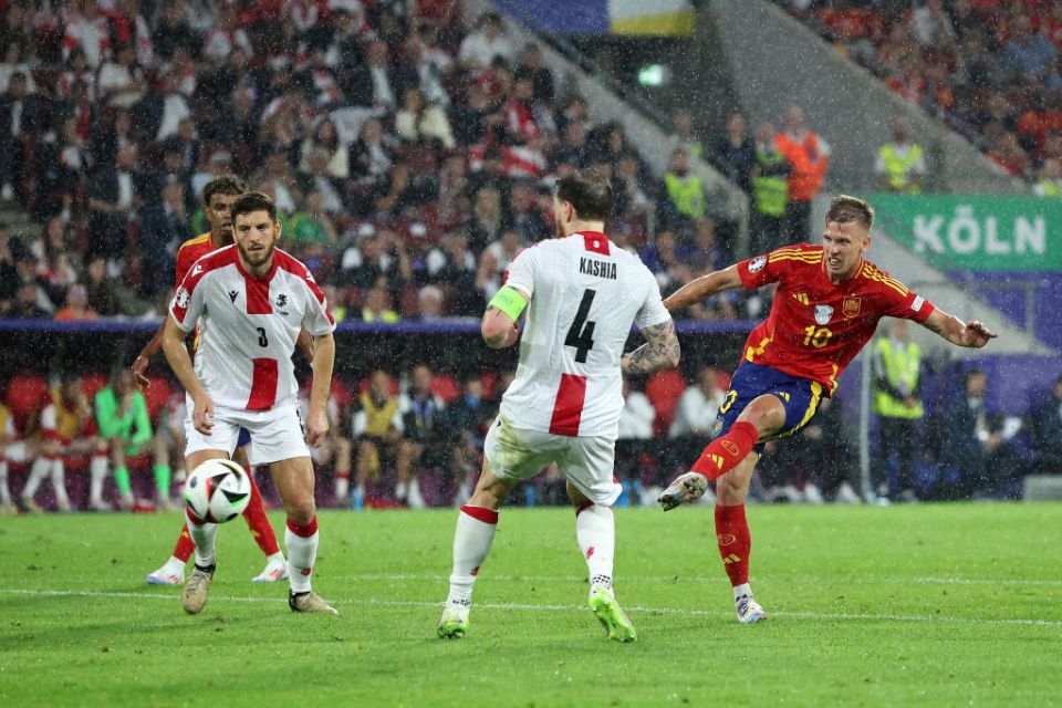 COLOGNE, GERMANY - JUNE 30: Dani Olmo of Spain scores his team's fourth goal during the UEFA EURO 2024 round of 16 match between Spain and Georgia at Cologne Stadium on June 30, 2024 in Cologne, Germany. (Photo by Alex Grimm/Getty Images)