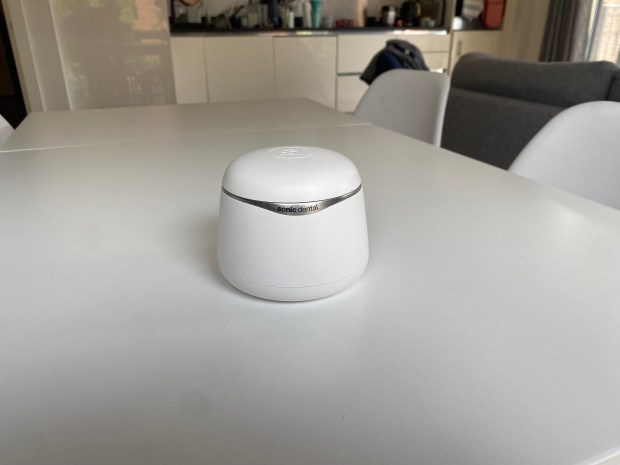 Sonic Dental device on a table.