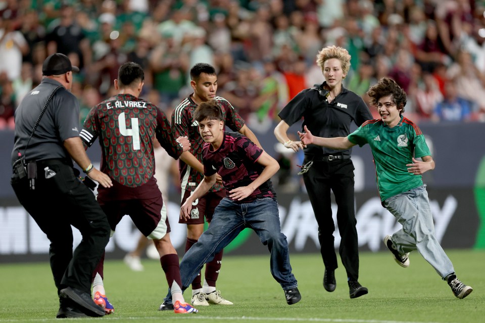 Two spectators ran on to the pitch during Mexico's 4-0 defeat to Uruguay